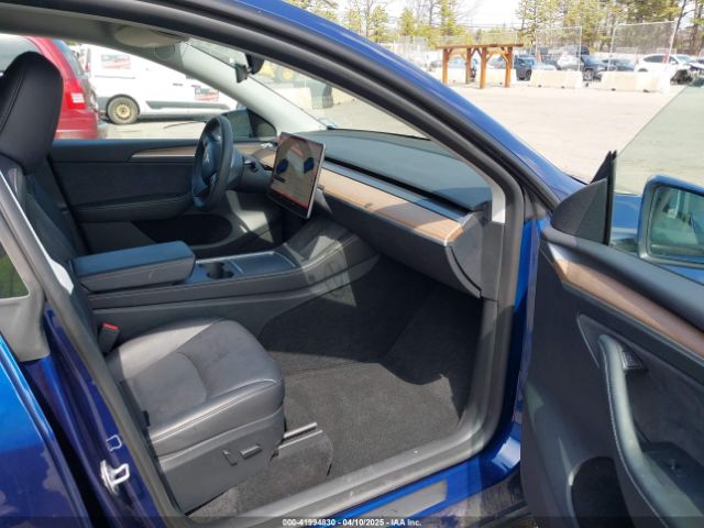 2023 TESLA MODEL Y 7SAYGAEE0PF892595 Photo 4