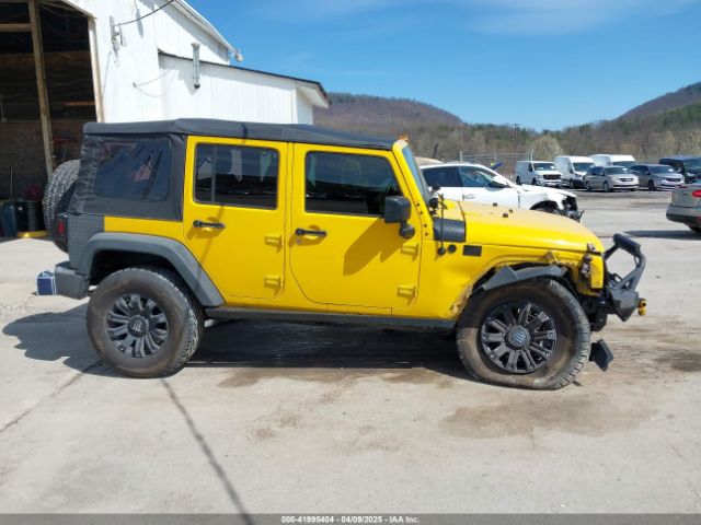 1C4BJWDG9FL582249 Jeep Wrangler Unlimited Sport