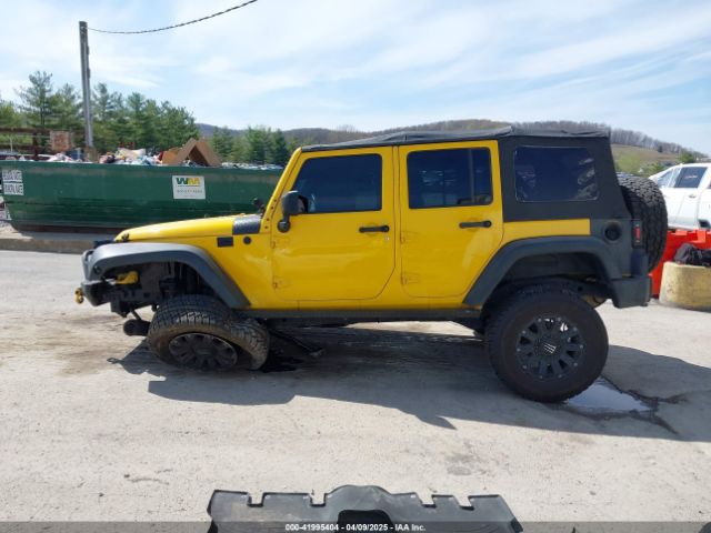 1C4BJWDG9FL582249 Jeep Wrangler Unlimited Sport