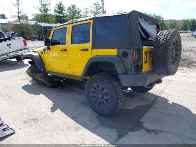 1C4BJWDG9FL582249 Jeep Wrangler Unlimited Sport