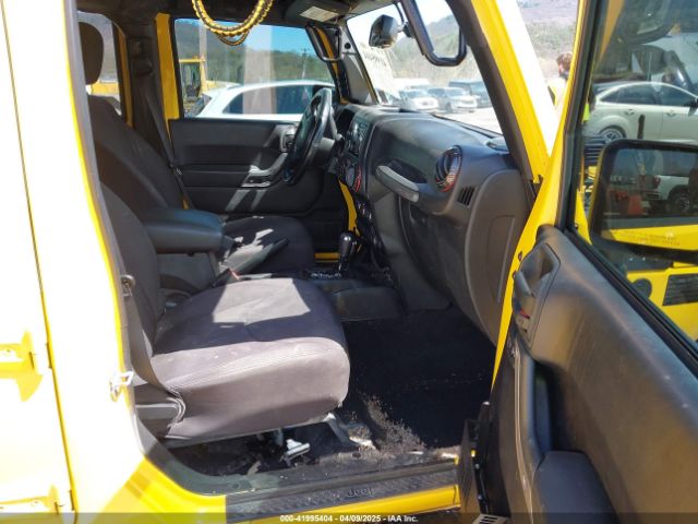 1C4BJWDG9FL582249 Jeep Wrangler Unlimited Sport