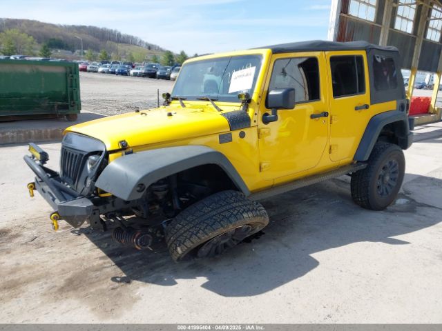1C4BJWDG9FL582249 Jeep Wrangler Unlimited Sport