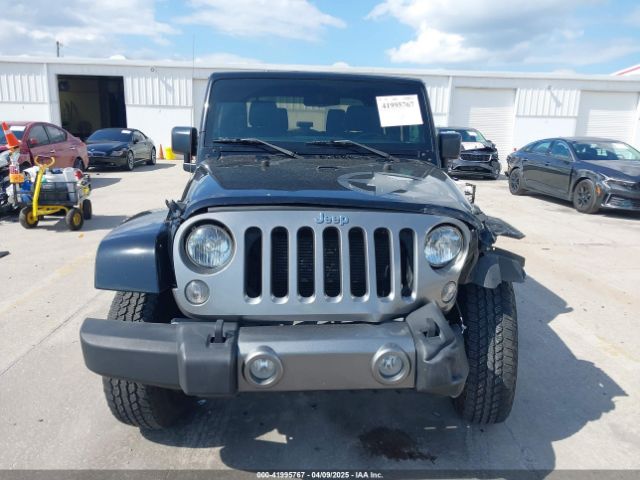 1C4AJWAG4FL594017 Jeep Wrangler Freedom Edition