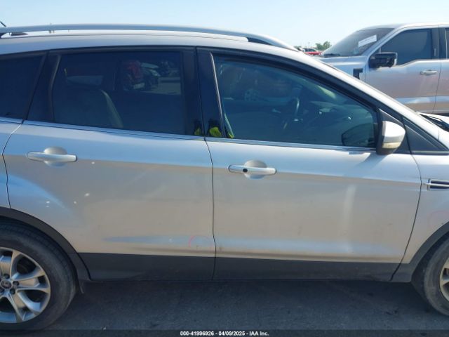 1FMCU0J9XEUA85567 Ford Escape Titanium