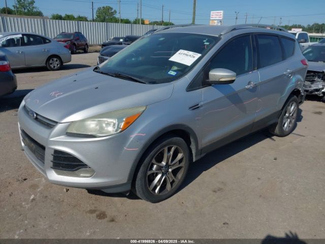 1FMCU0J9XEUA85567 Ford Escape Titanium