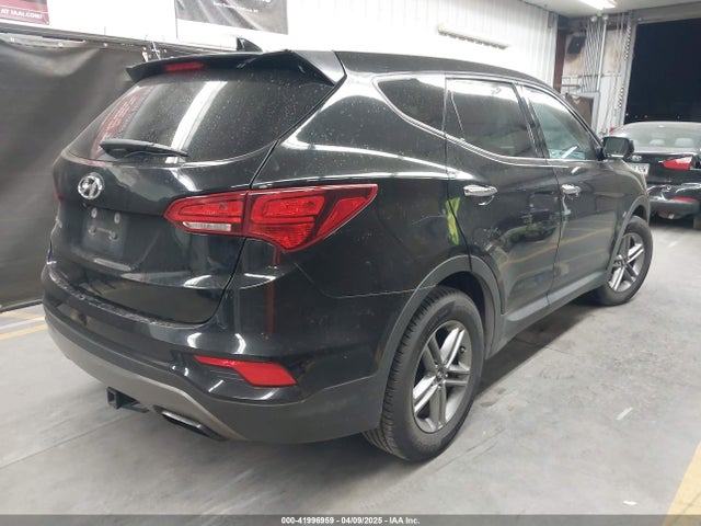 5NMZTDLBXHH000599 Hyundai Santa Fe Sport 2.4l