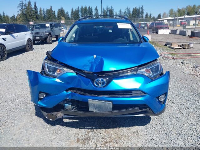 JTMRJREV9GD055062 Toyota Rav4 Hybrid Xle