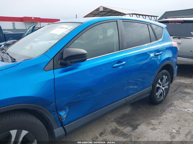 JTMBFREV8JJ220630 Toyota RAV4 LE