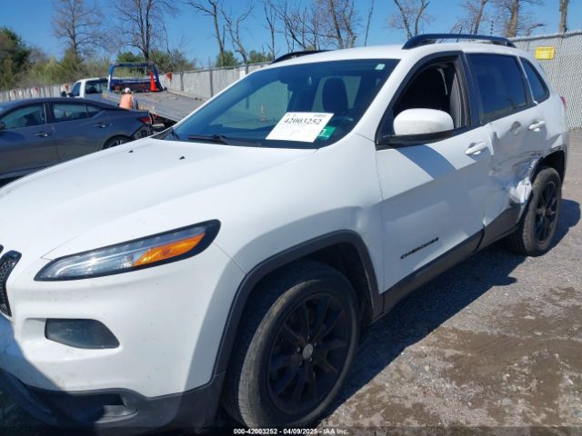 1C4PJMCS9EW309289 Jeep Cherokee Altitude