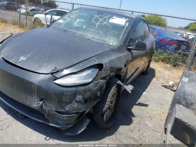 2022 TESLA MODEL Y 7SAYGDEE9NA022842 Photo 1