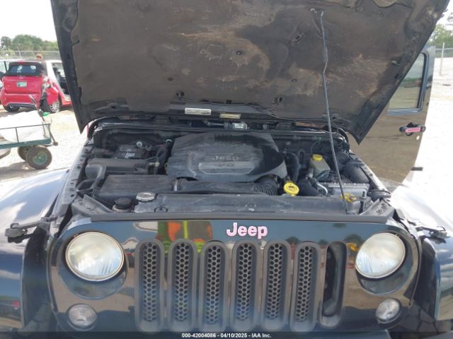 1C4BJWEG9FL529646 Jeep Wrangler Unlimited Sahara