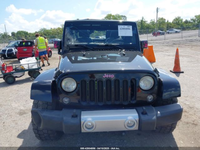 1C4BJWEG9FL529646 Jeep Wrangler Unlimited Sahara