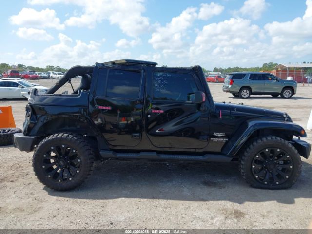 1C4BJWEG9FL529646 Jeep Wrangler Unlimited Sahara