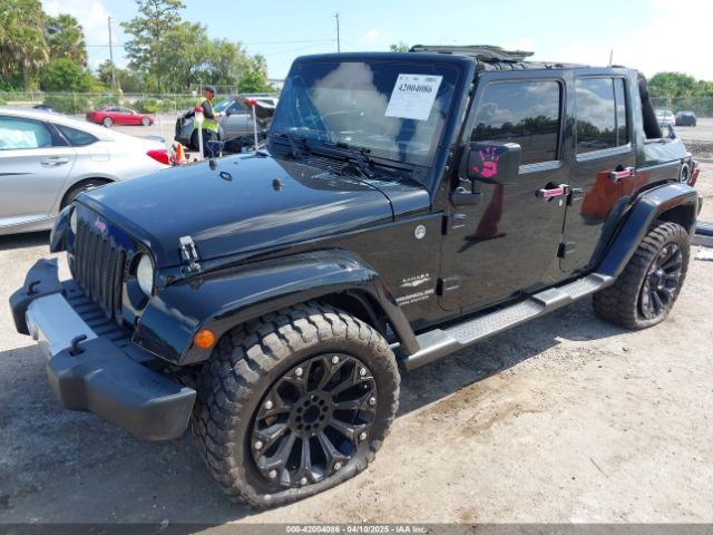 1C4BJWEG9FL529646 Jeep Wrangler Unlimited Sahara