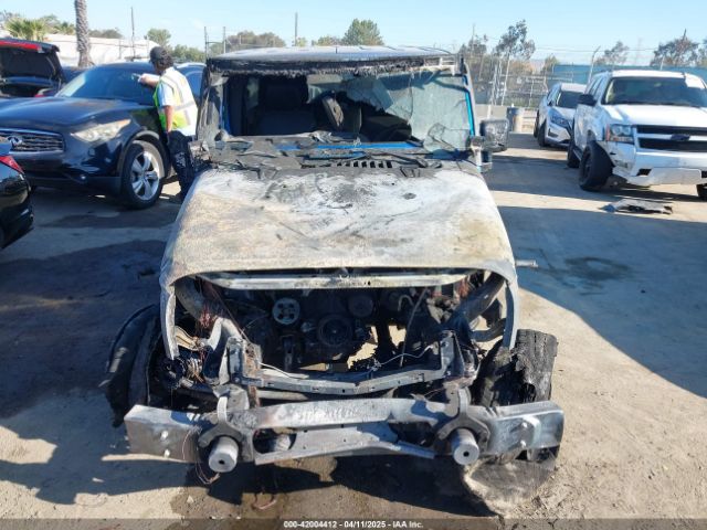 1C4HJWEG8EL261519 Jeep Wrangler Unlimited Altitude