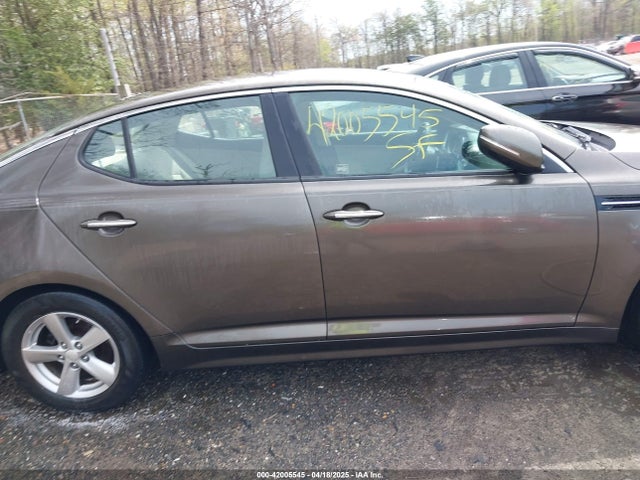 5XXGM4A70EG290199 KIA Optima Lx