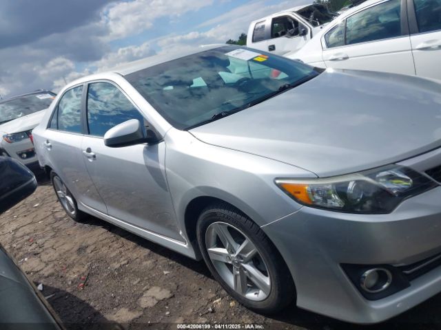 4T1BF1FK2EU302732 Toyota CAMRY SE