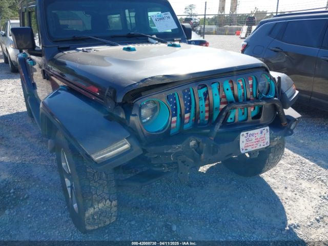 1C4HJXEN5JW261250 Jeep Wrangler Unlimited Sahara 4x4