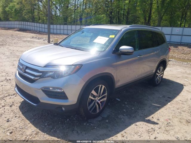5FNYF6H07JB001030 Honda Pilot Elite