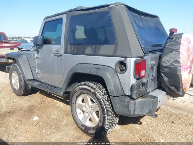 1C4AJWAG5GL204706 Jeep Wrangler Sport