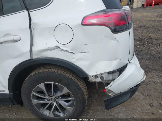 JTMRJREV9GD013779 Toyota Rav4 Hybrid Xle