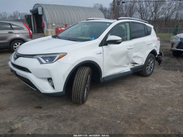 JTMRJREV9GD013779 Toyota Rav4 Hybrid Xle