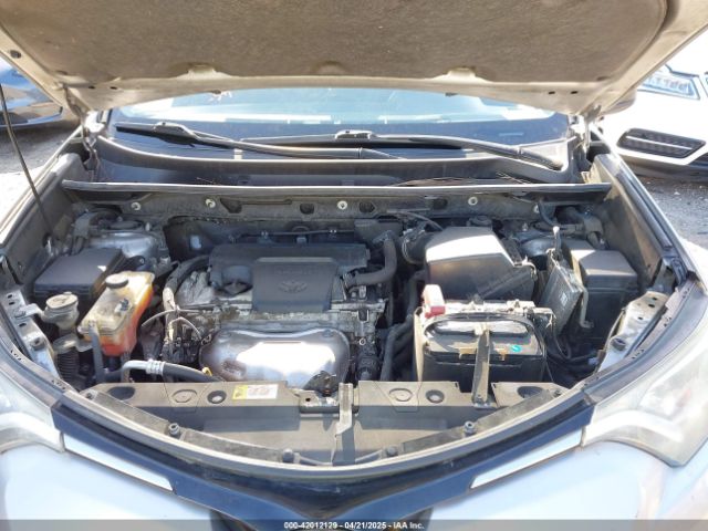 JTMZFREV9JJ162297 Toyota RAV4 LE
