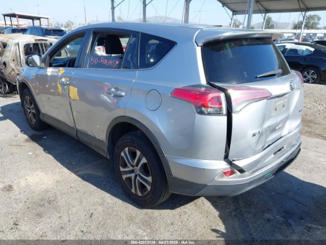 JTMZFREV9JJ162297 Toyota RAV4 LE