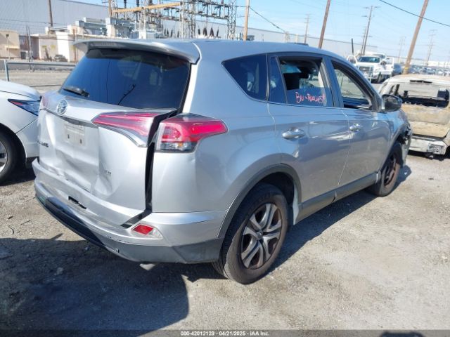 JTMZFREV9JJ162297 Toyota RAV4 LE