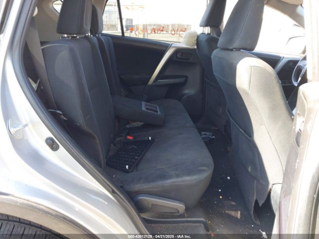 JTMZFREV9JJ162297 Toyota RAV4 LE