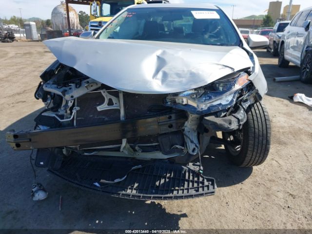 2T1BURHE5EC089448 Toyota Corolla Le Premium