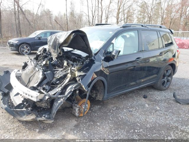 5FNYF8H00KB010472 Honda Passport Elite