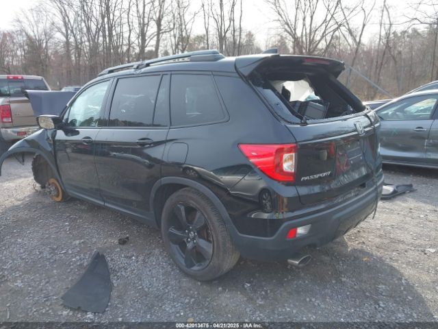 5FNYF8H00KB010472 Honda Passport Elite