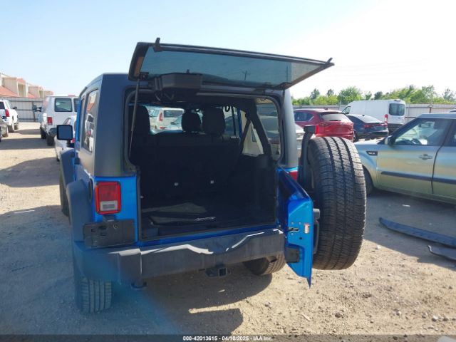 1C4BJWDG3GL306487 Jeep Wrangler Unlimited Sport