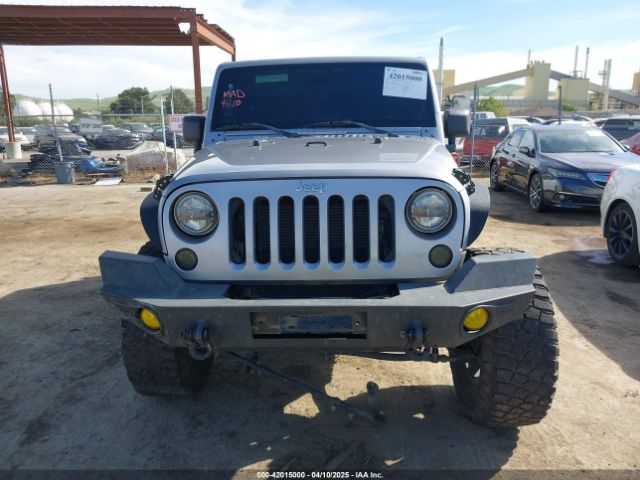 1C4AJWAG5EL206565 Jeep Wrangler Sport