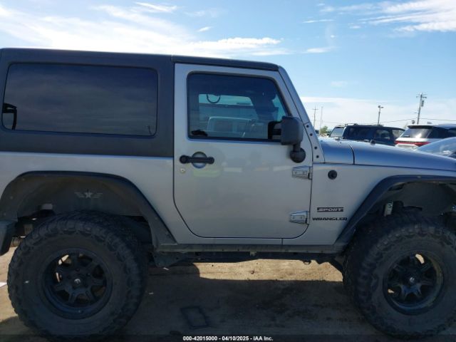 1C4AJWAG5EL206565 Jeep Wrangler Sport