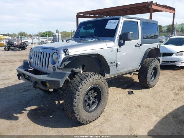 1C4AJWAG5EL206565 Jeep Wrangler Sport