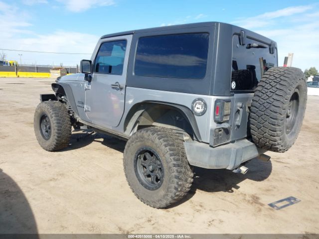 1C4AJWAG5EL206565 Jeep Wrangler Sport