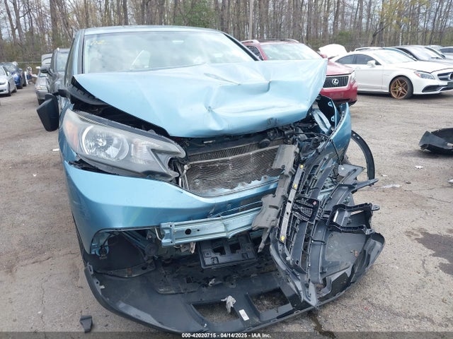 2HKRM3H32EH517323 Honda CR-V LX