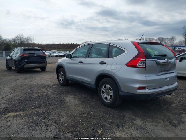 2HKRM4H34GH613530 Honda CR-V LX