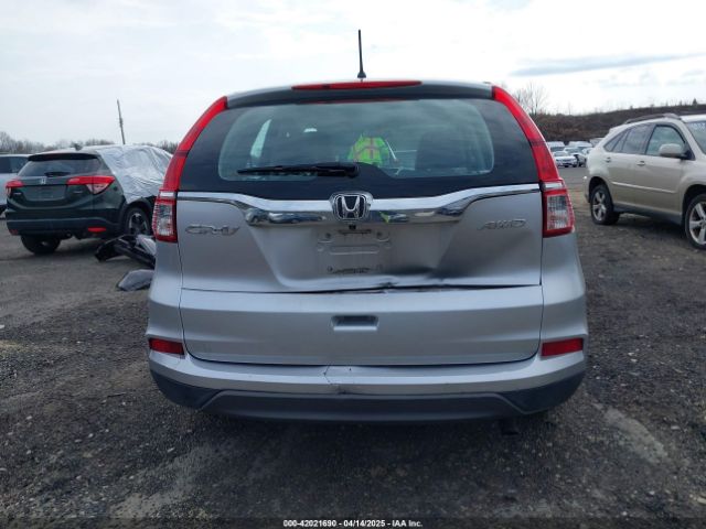 2HKRM4H34GH613530 Honda CR-V LX