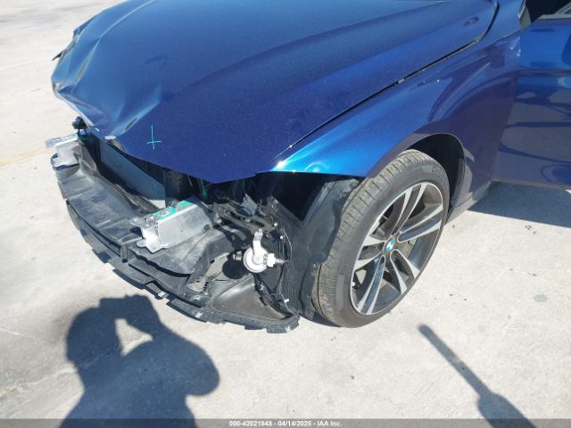WBA8B9C50JAE22077 BMW 330I