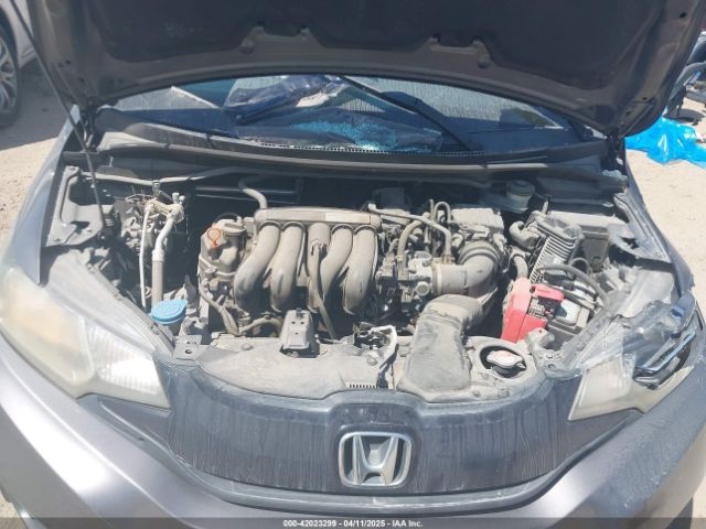 JHMGK5H56GX041075 Honda FIT LX