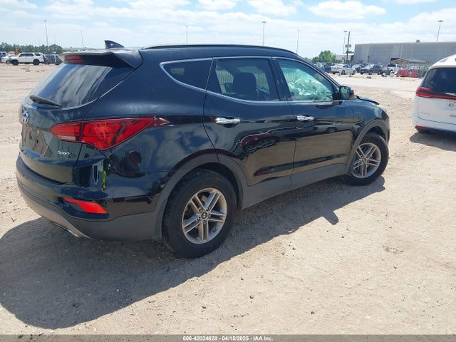 5NMZU3LB1HH048600 Hyundai Santa Fe Sport 2.4l