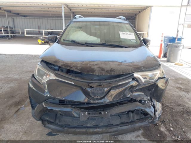 2T3ZFREV3GW301060 Toyota RAV4 LE