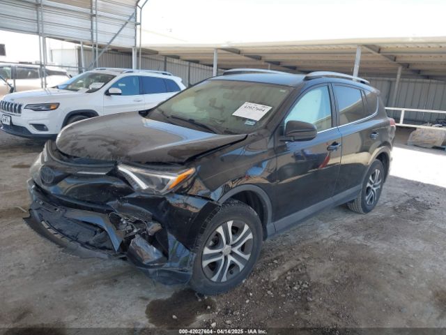 2T3ZFREV3GW301060 Toyota RAV4 LE