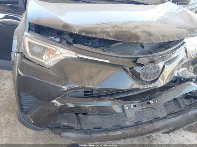2T3ZFREV3GW301060 Toyota RAV4 LE