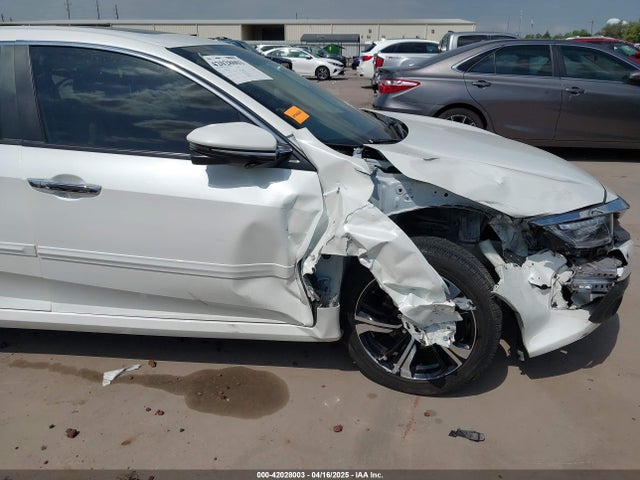 JHMFC1F94JX009112 Honda Civic Touring