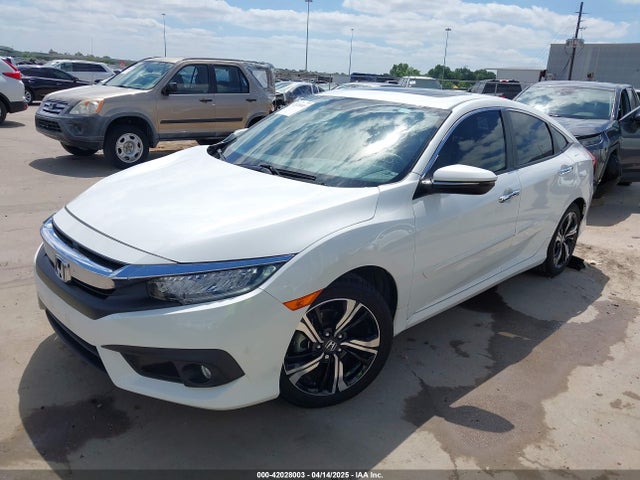 JHMFC1F94JX009112 Honda Civic Touring