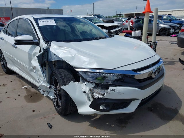 JHMFC1F94JX009112 Honda Civic Touring